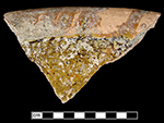 North Devon gravel tempered pan. Glazed interior and unglazed exterior. Approximately 13” rim diameter. Vessel 06, Lot 636. 